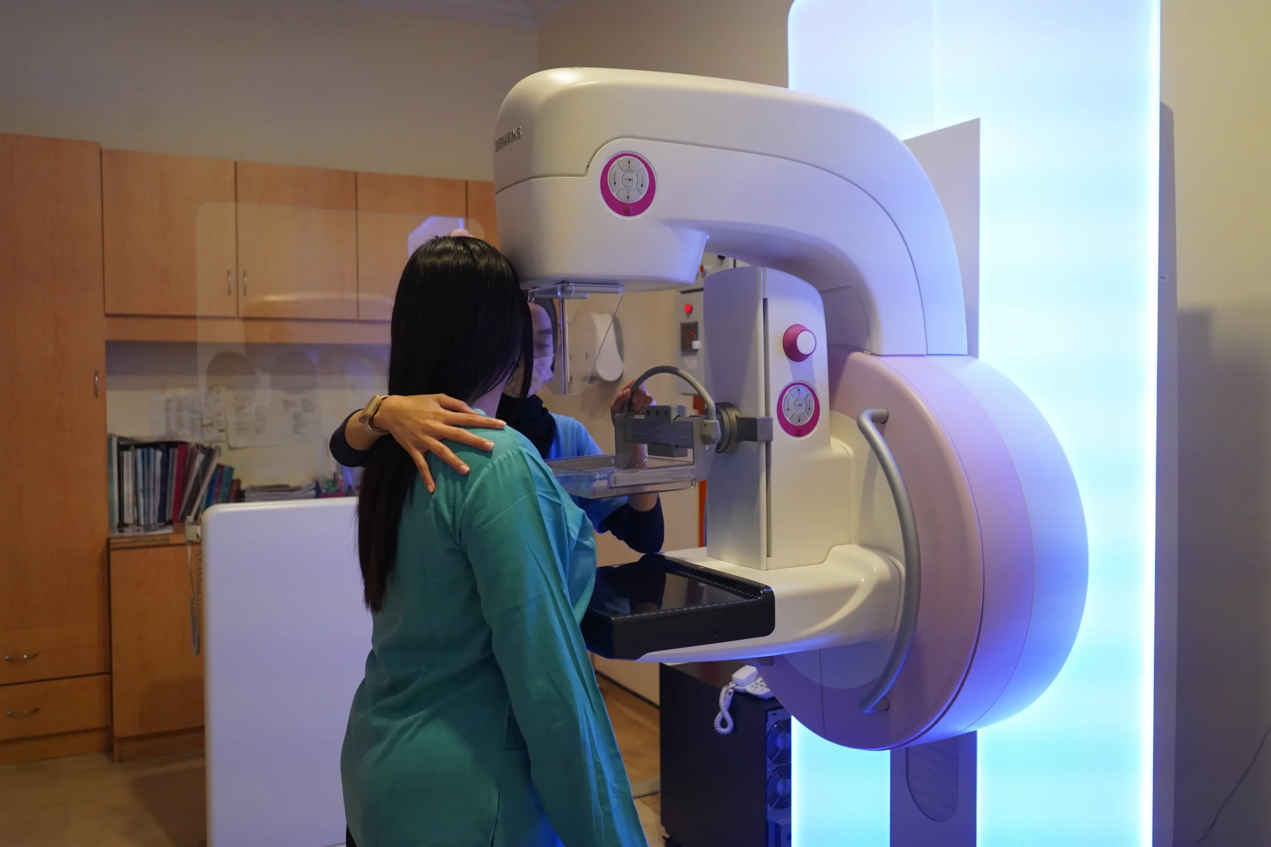 Doctor discussing medical screening results with a patient